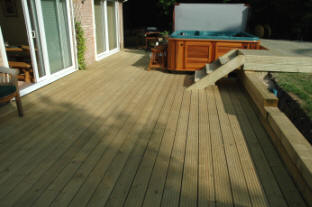 Large patio deck with hot tub