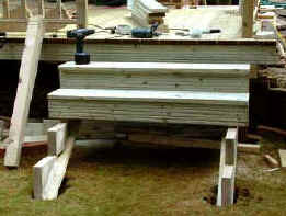 Decking staircase from front showing the decking fixed to the stringers